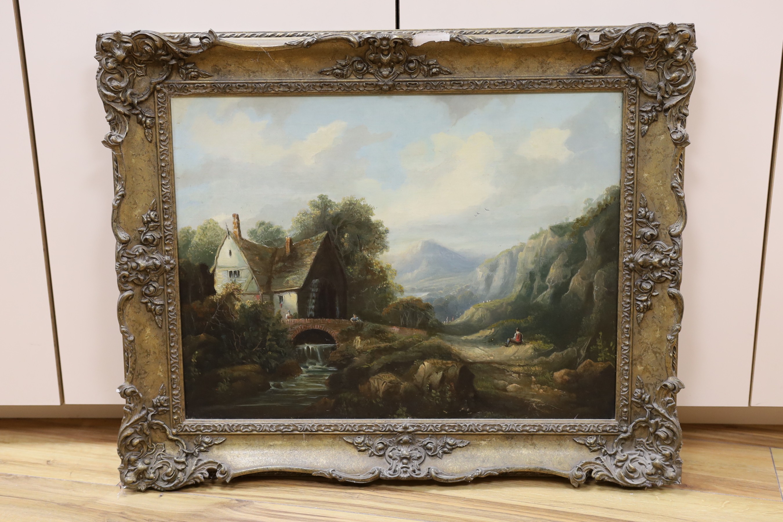 19th century English School, oil on canvas, Extensive landscape with figures beside a watermill, 45 x 60cm